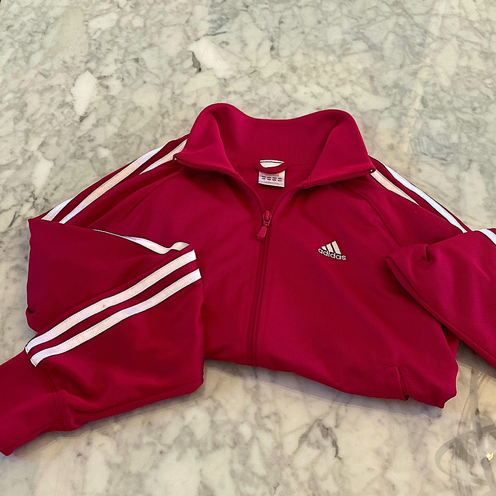 Like new! Worn lightly. Looks red in pic but it’s fuschia